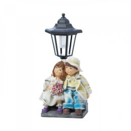 Couple With Solar Street Light Statue